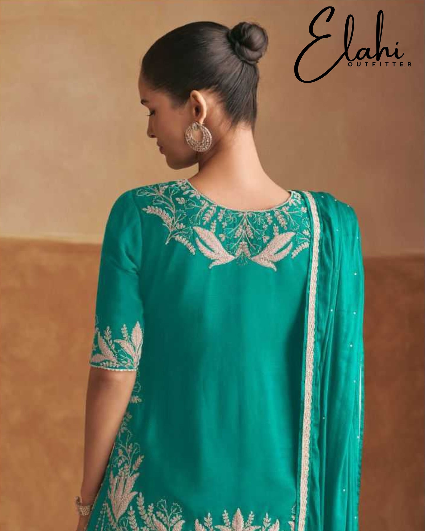 Regal Radiance: Designer Chinon Suit
