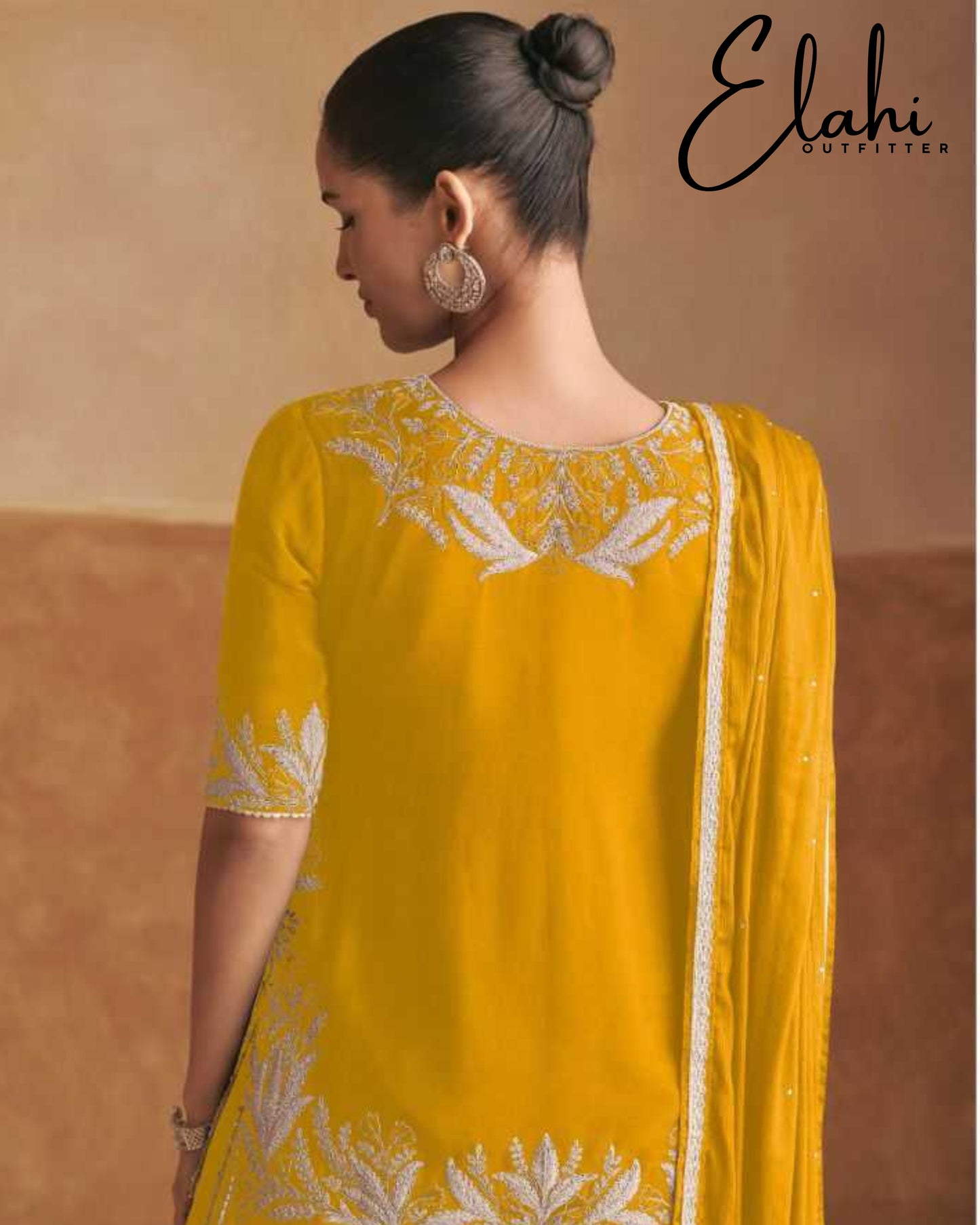 Regal Radiance: Designer Chinon Suit