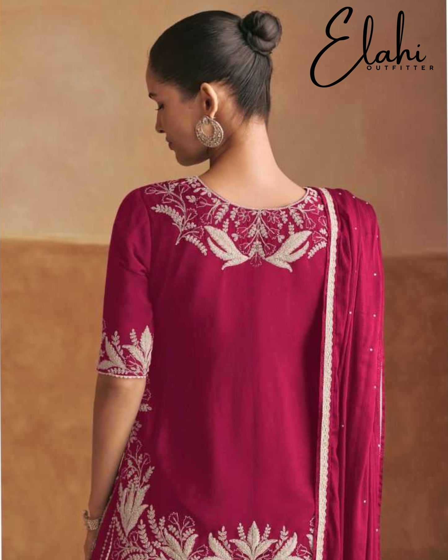 Regal Radiance: Designer Chinon Suit