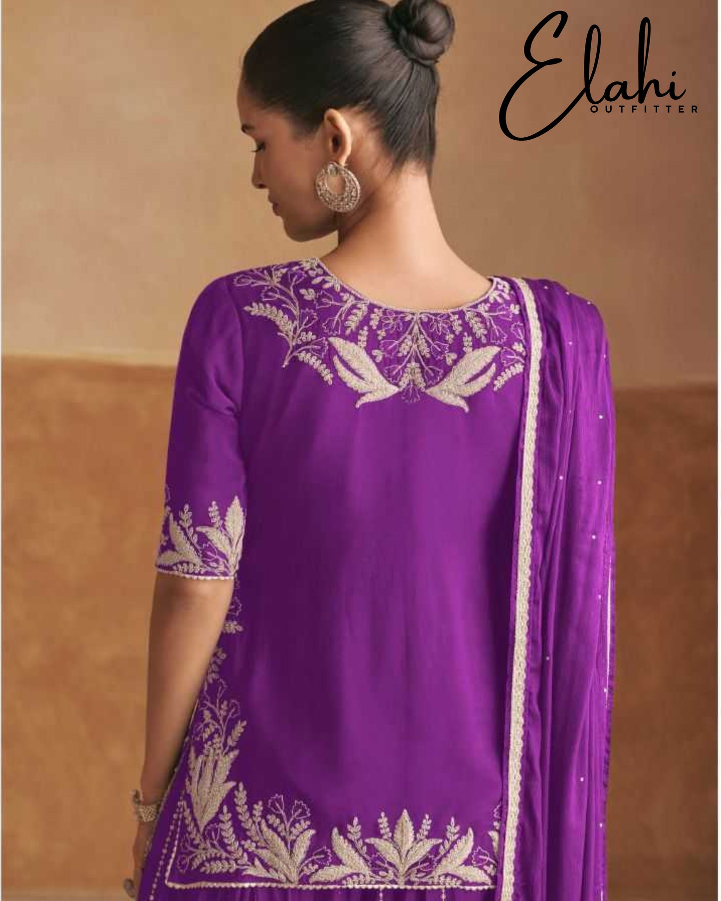 Regal Radiance: Designer Chinon Suit
